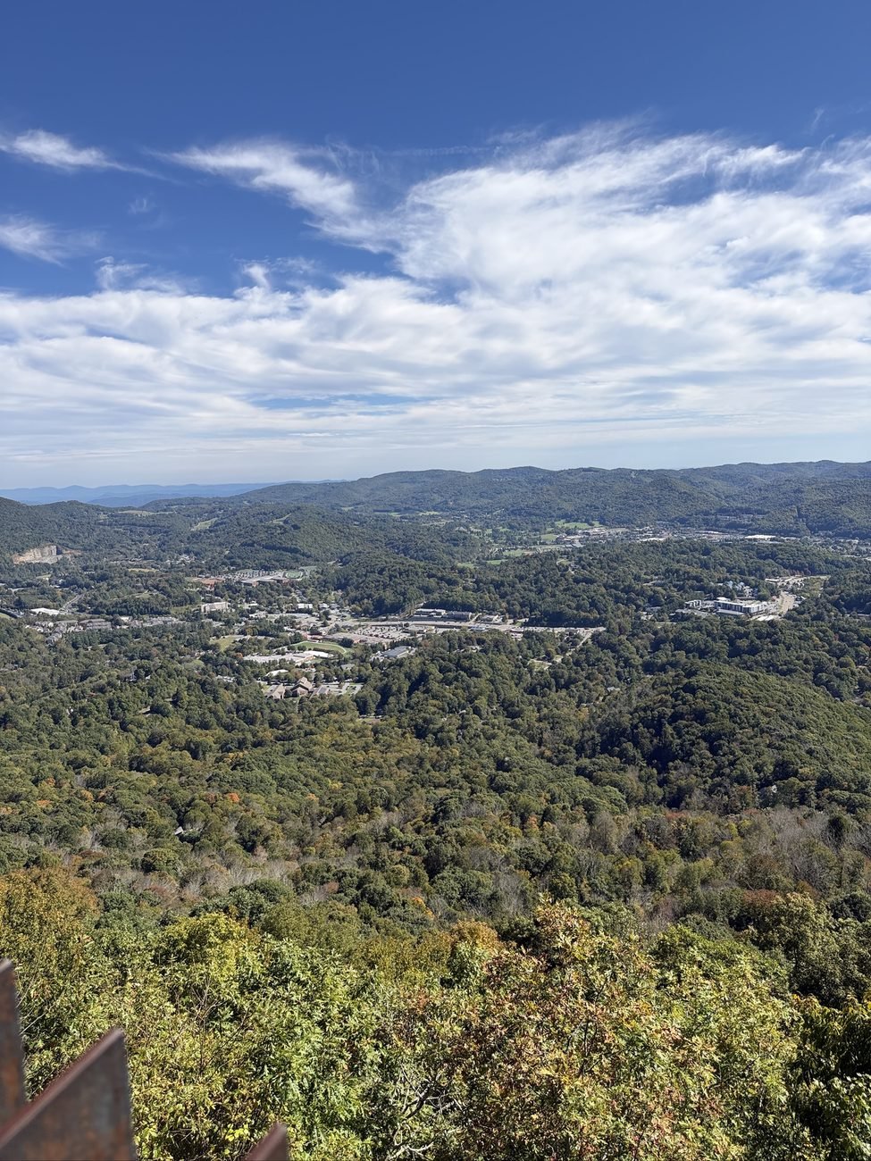 View over the Boone valley with layered ridges, early fall color and wispy clouds
